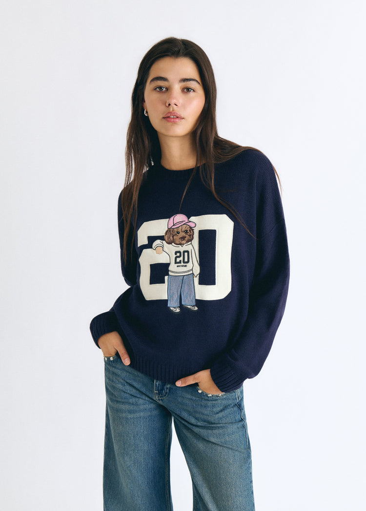 Jersey marino de punto con un diseño gráfico de un perrito y el número 20