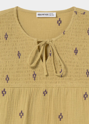 Embroidered smocked blouse
