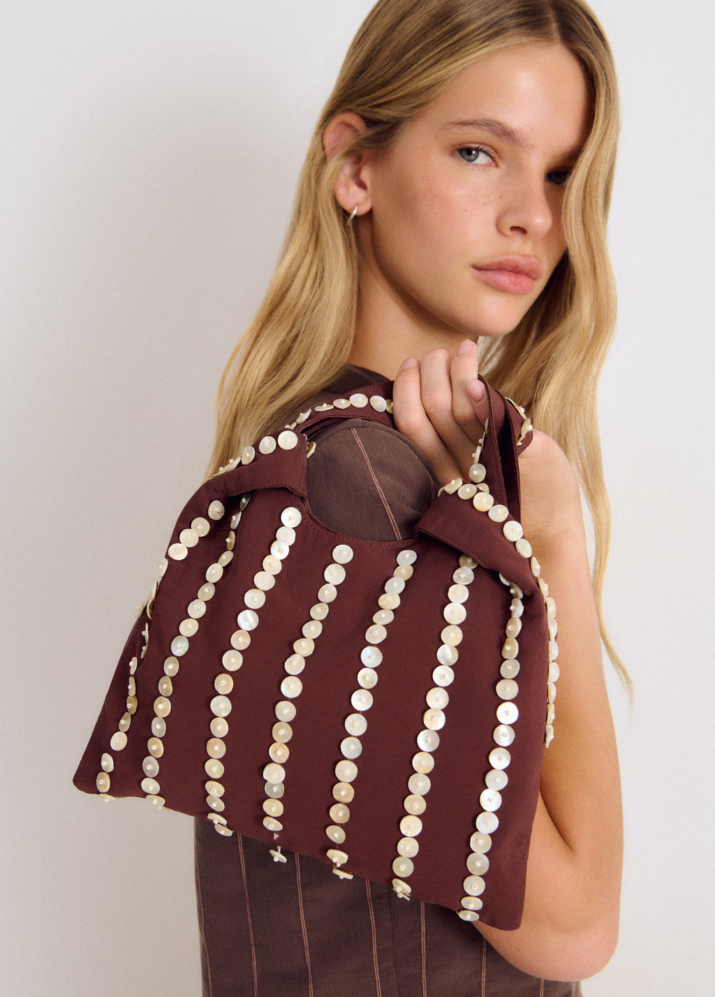 Bolso pequeño mano nácar