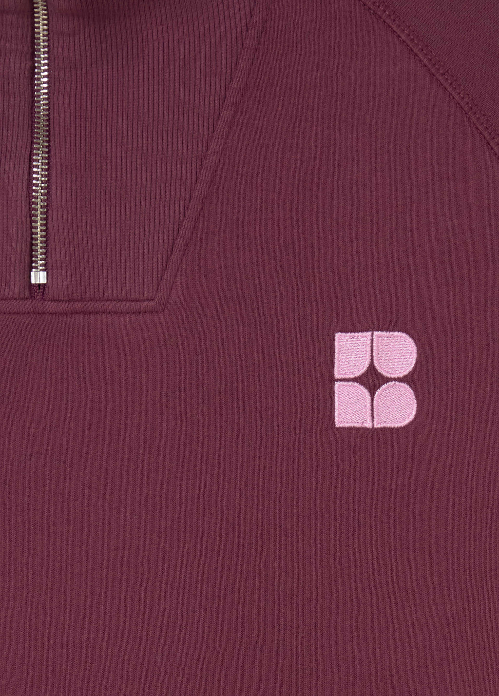 Sudadera de cremallera en granate oscuro con el logo bordado en tono rosa claro