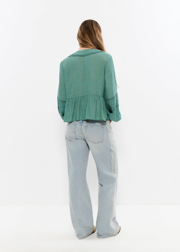Blusa volant ricamati