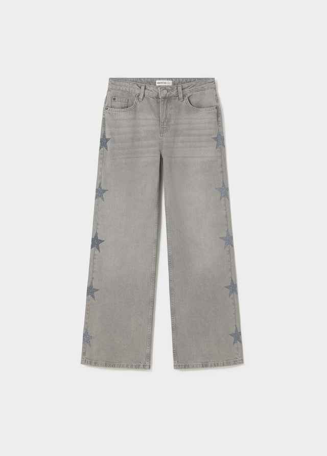 Jeans multi-étoiles côté