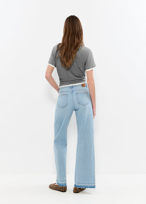 Relaxed jeans with studs and unfolded hem
