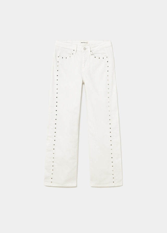Pantalón pieza lateral tachuelas