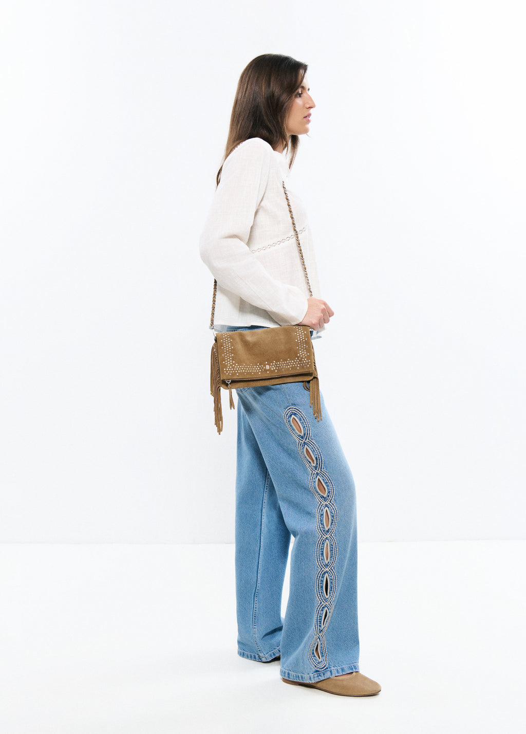 Sac rabat petits clous franges cuir