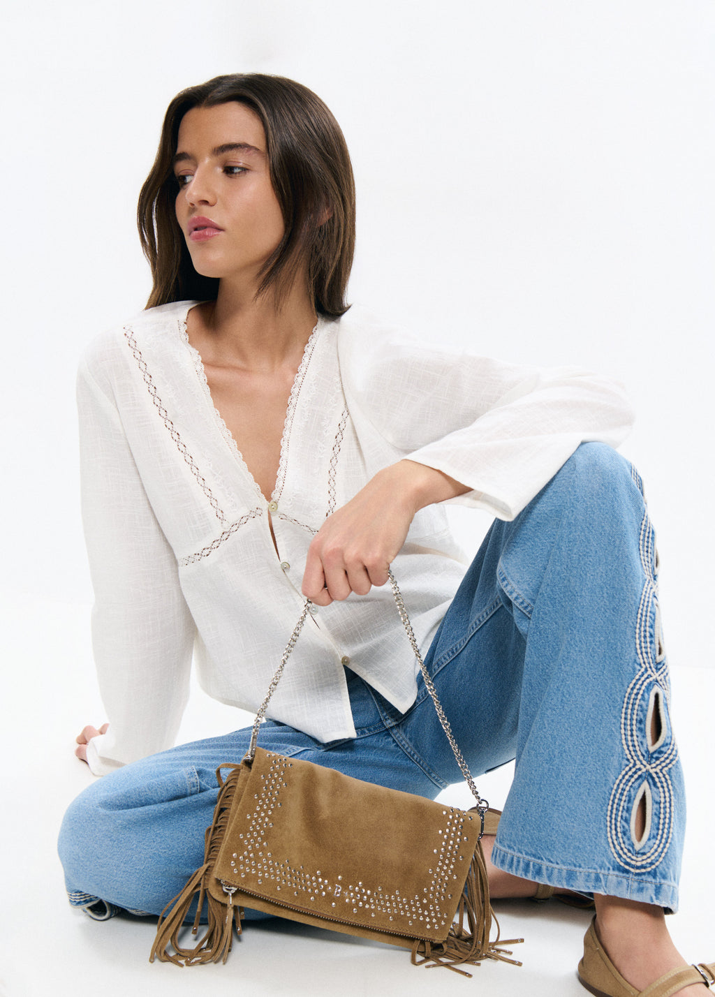 Sac rabat petits clous franges cuir