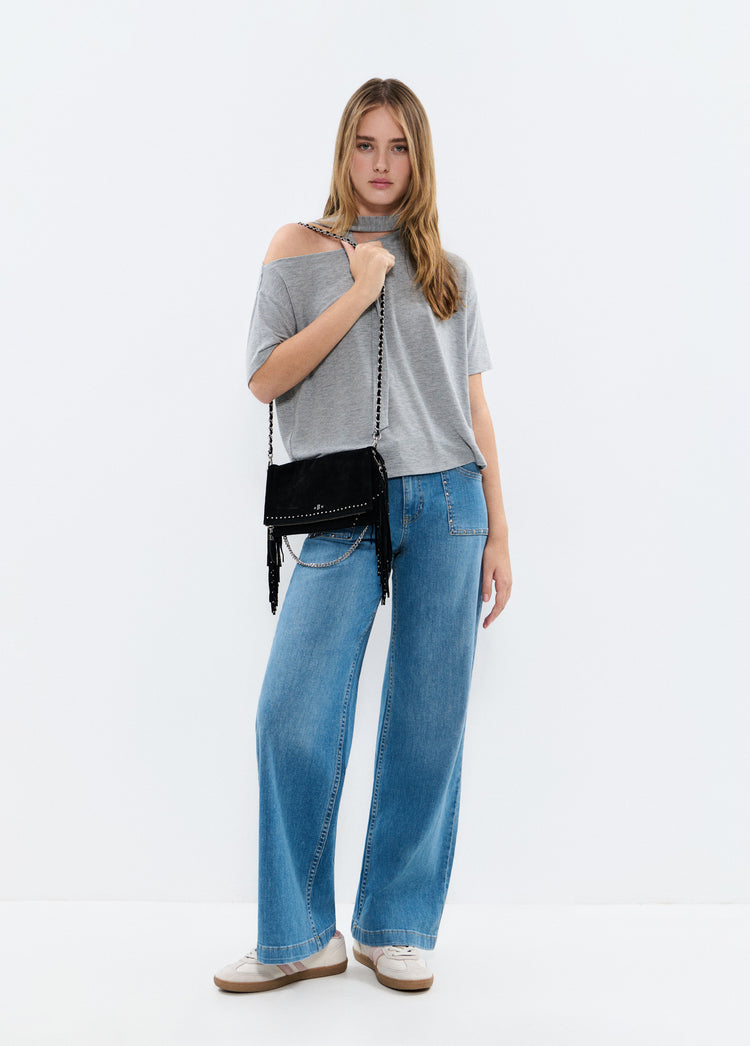 Bolso solapa tachitas flecos