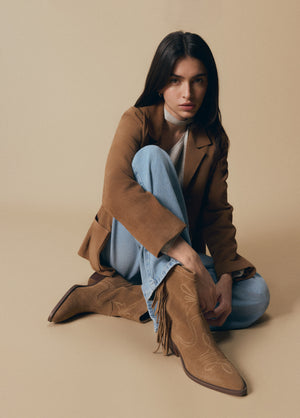 Botín cowboy flecos cuero