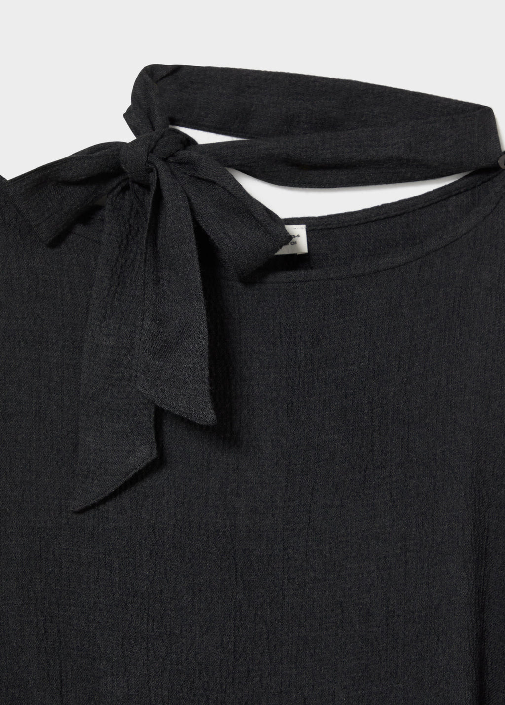 Capa detalle tachas y bufanda