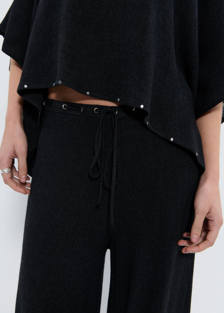Cape met studs en sjaal