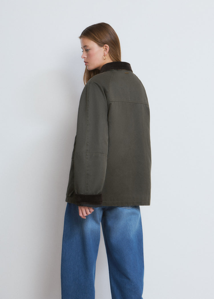 Gewaxte jas met sherpa-vest