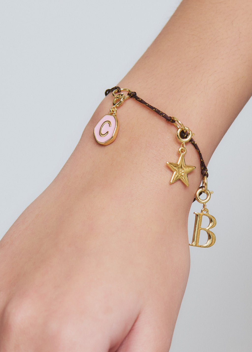 Initial C charm