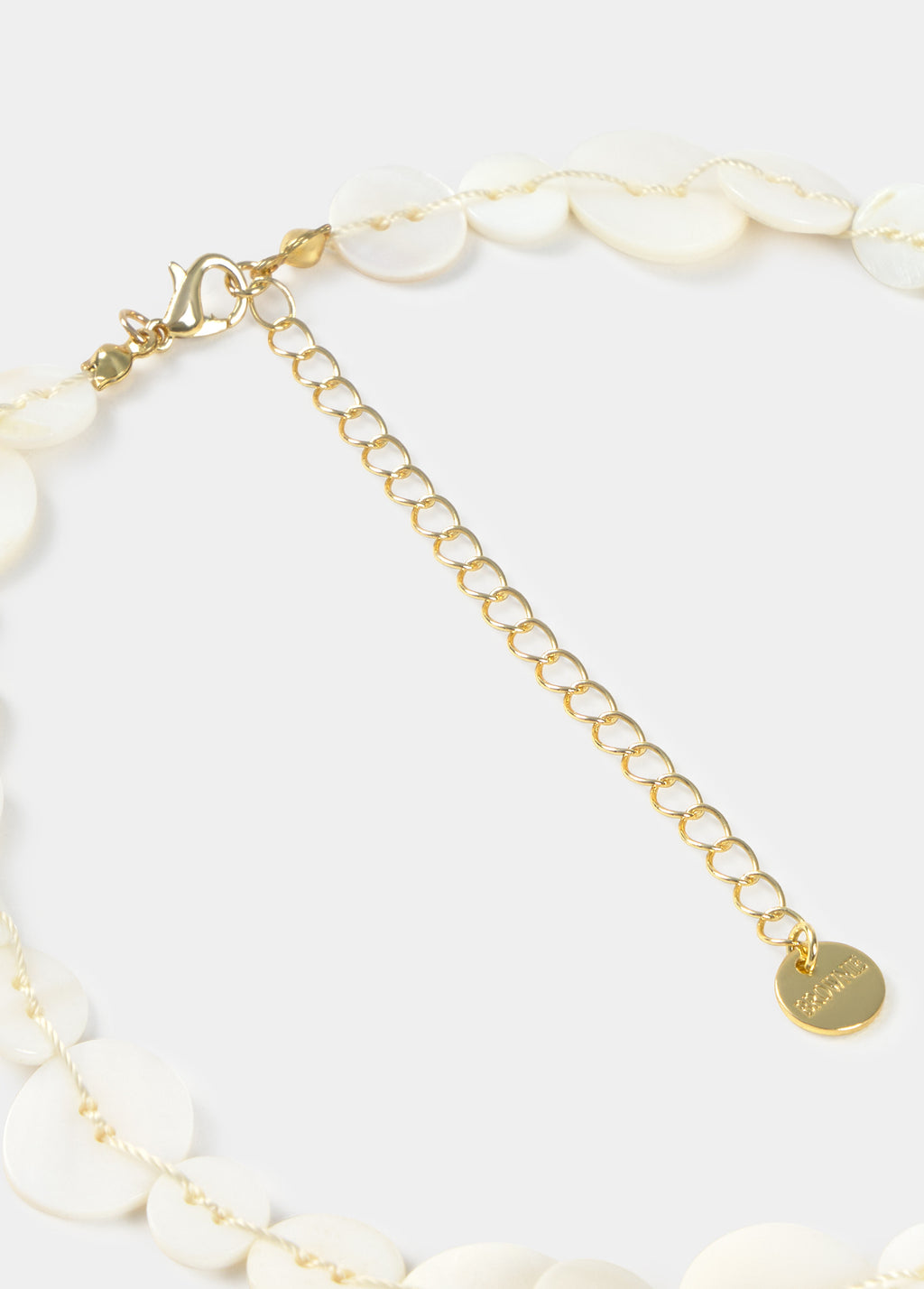 Ketting met parelmoeren knopen