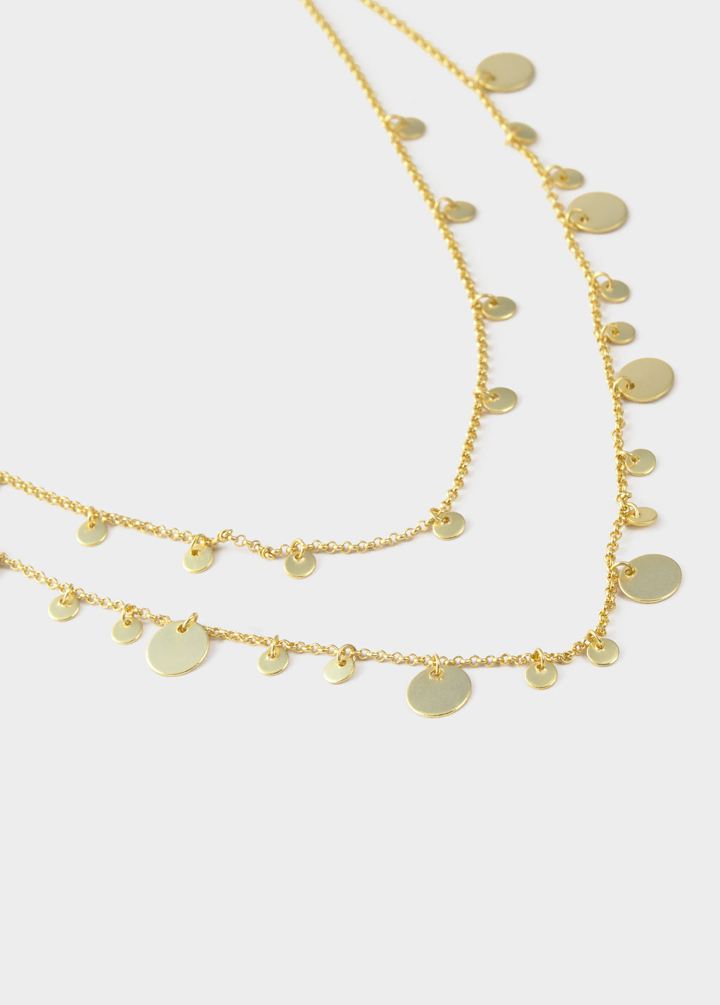 Colar duplo com medalhas