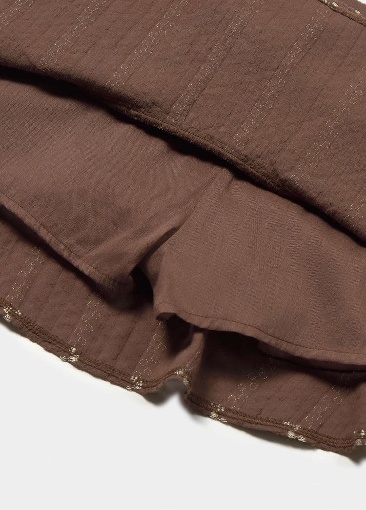 Falda corta volantes