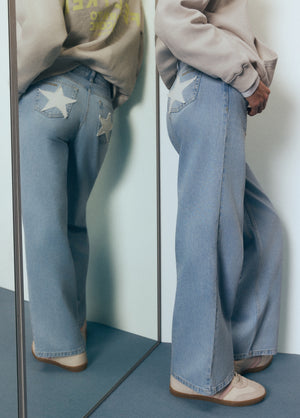 Jeans 5 bolsos remendo estrela