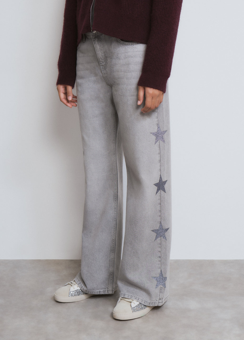 Jeans multi-étoiles côté