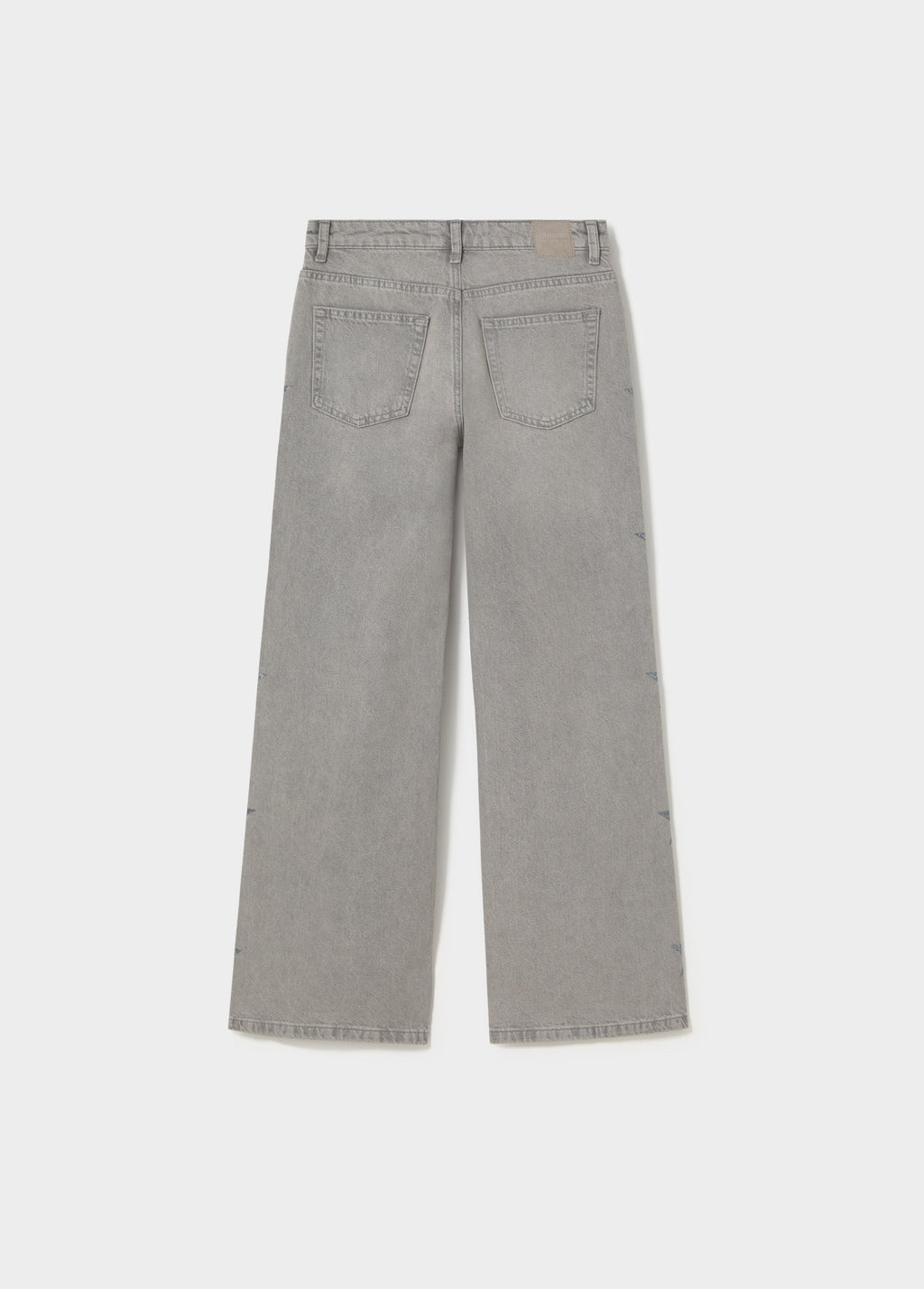 Jeans multi-étoiles côté