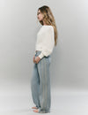 Jeans with side cross-stitch panel
