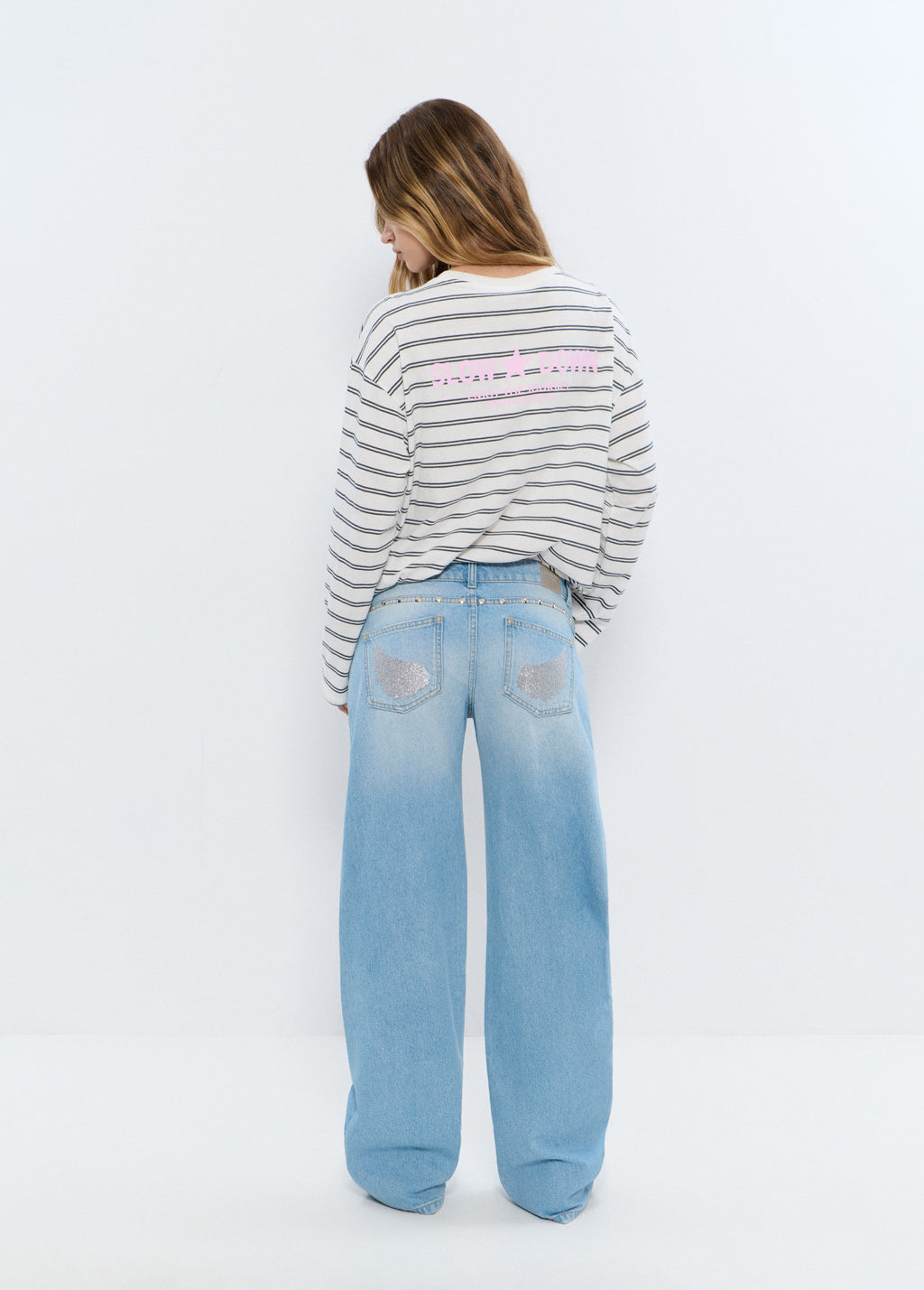 Jean taille basse ailes pailletées