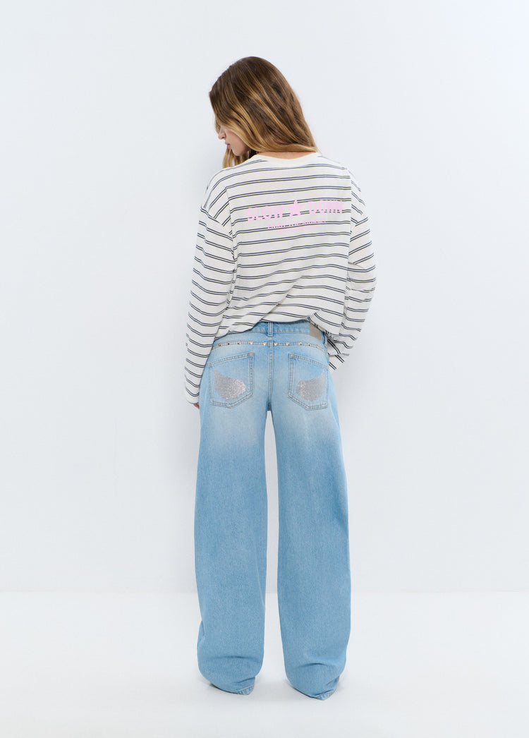 Jeans tiro bajo alas glitter