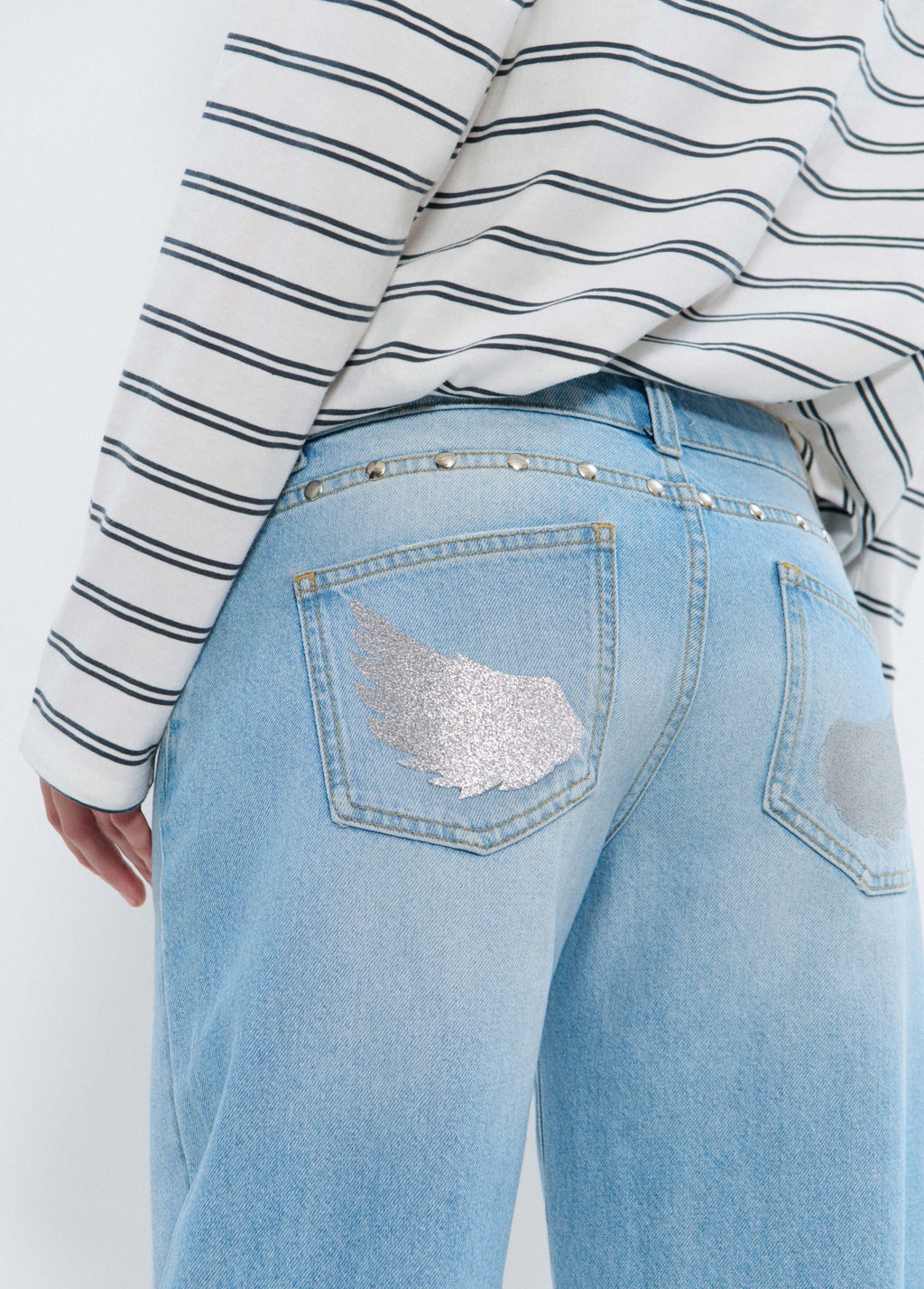 Jean taille basse ailes pailletées