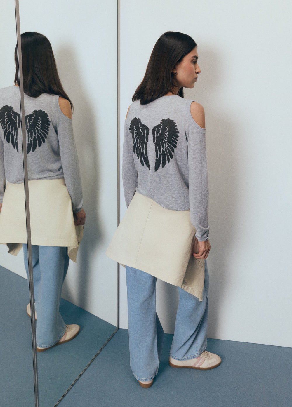 Jersey apertura hombros alas espalda