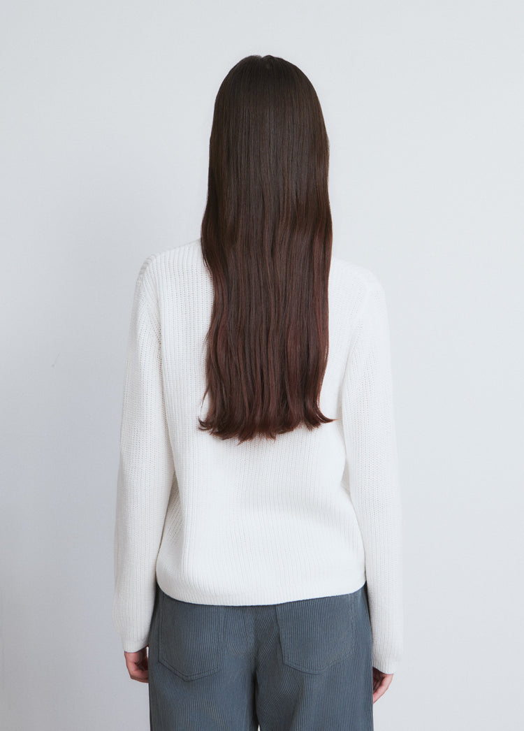 Embroidered sweater with flocked star