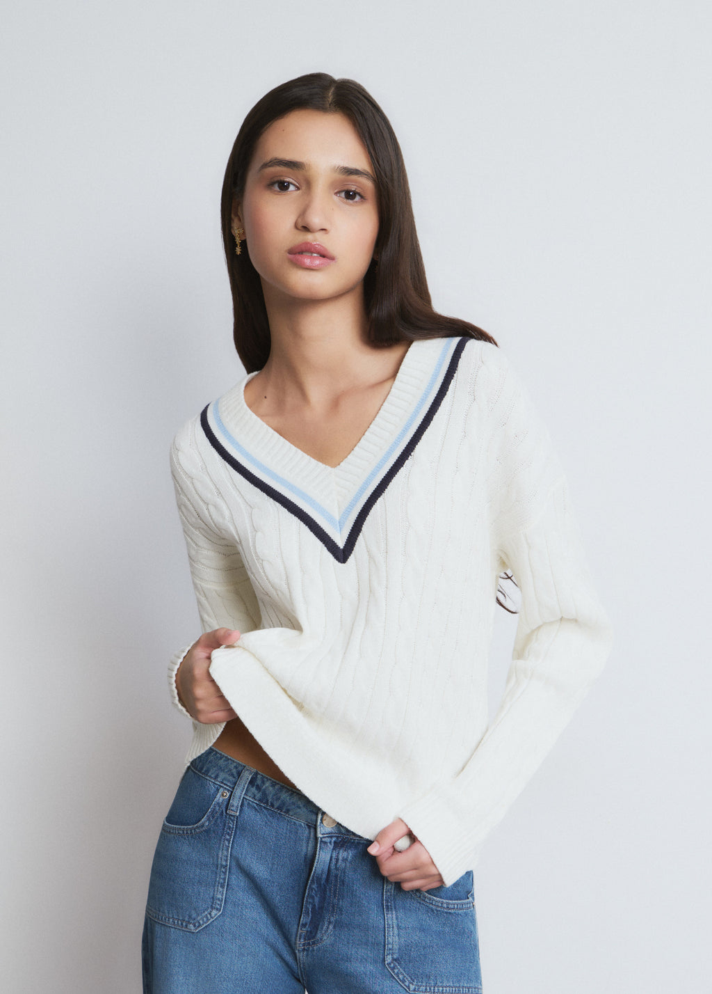 Jersey cuello pico trenzas