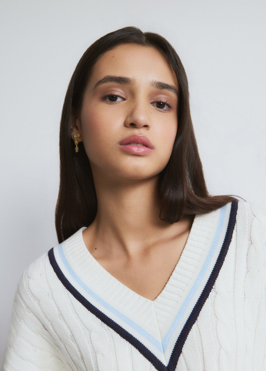 Jersey cuello pico trenzas