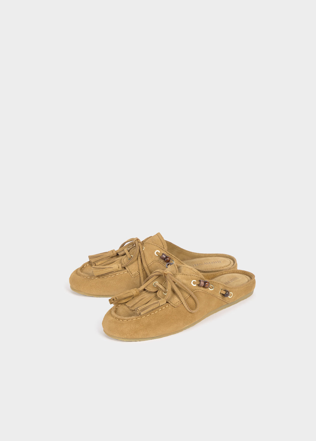 Mule mocassin à pompons cuir