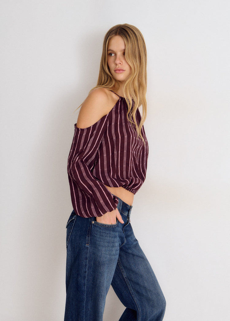 Long-sleeved striped cut-out blouse