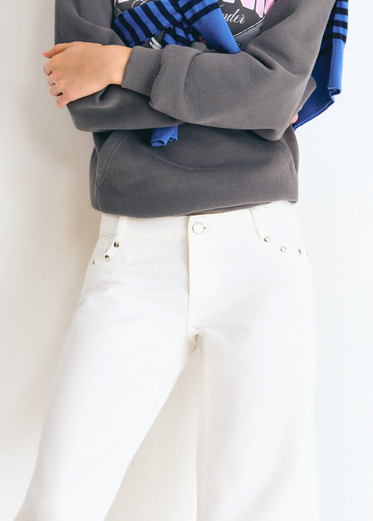 Pantalón tiro bajo estrellas glitter y tachas