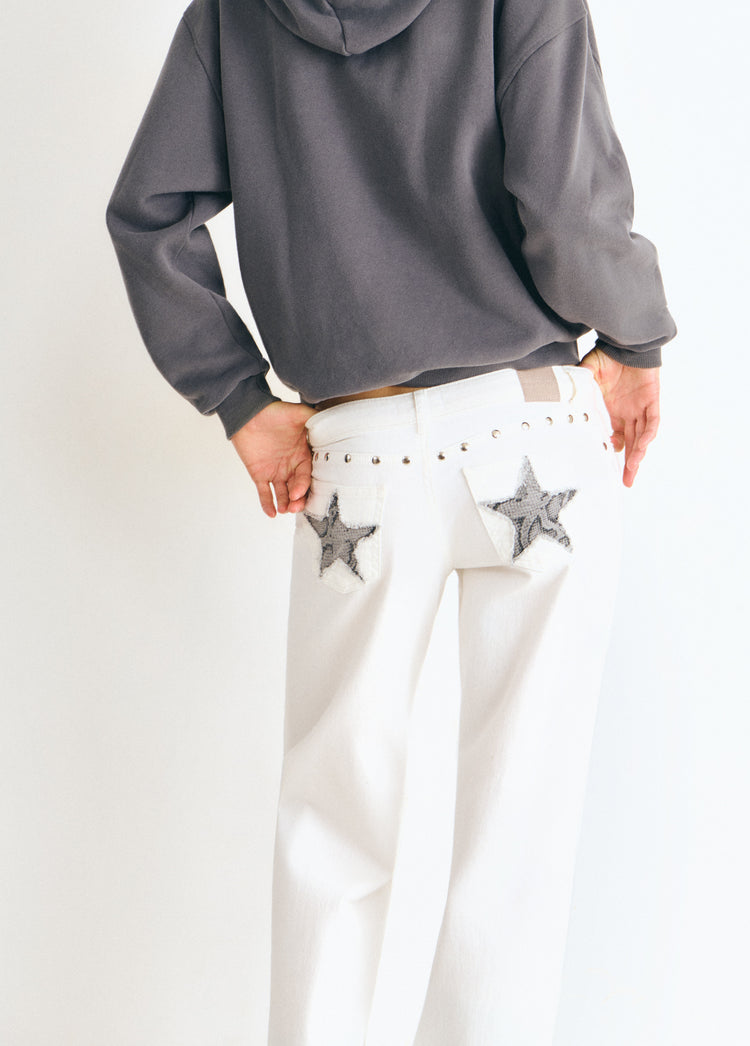 Pantalón tiro bajo estrellas glitter y tachas