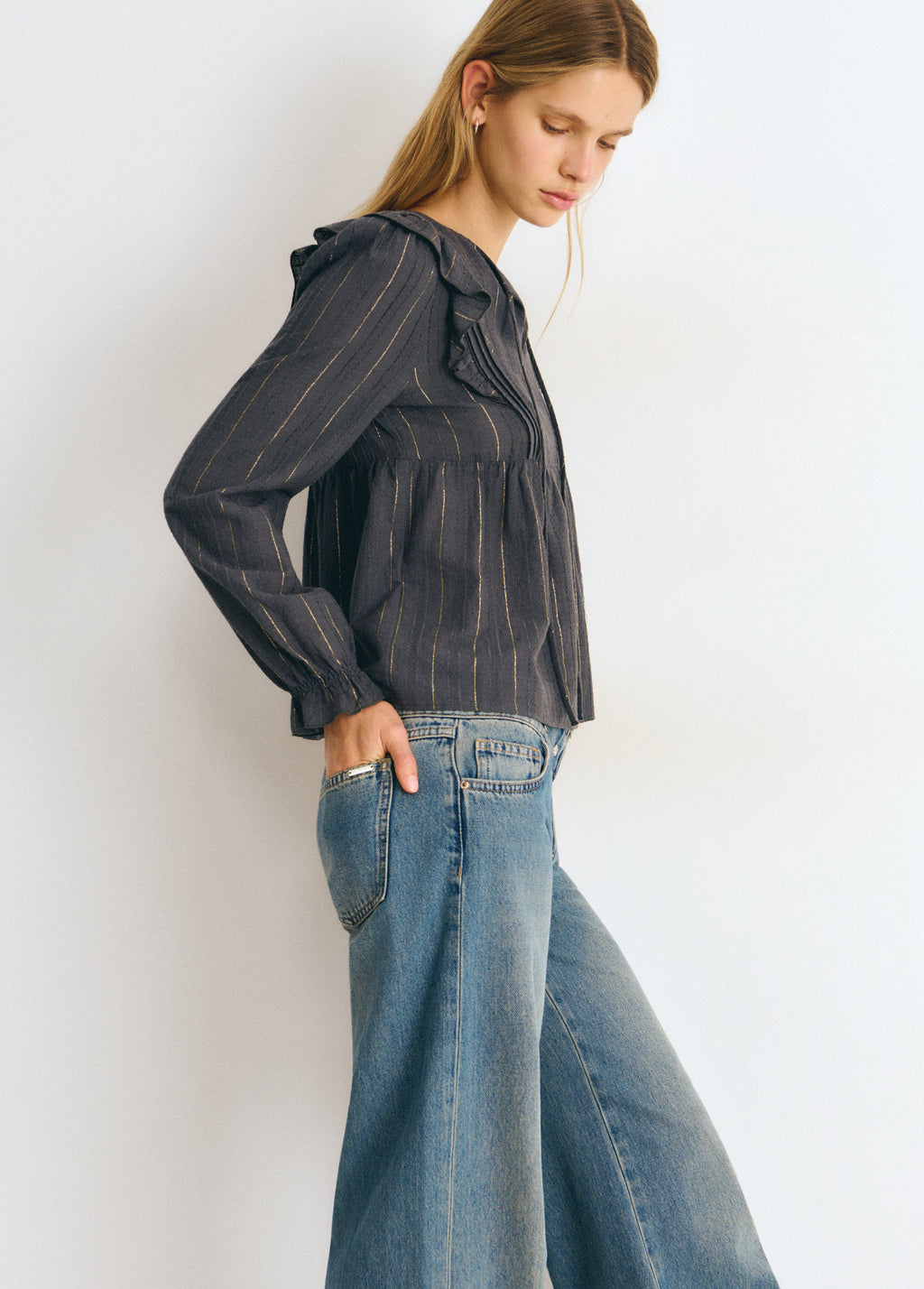 Blouse with ruffle detail and lurex stripe