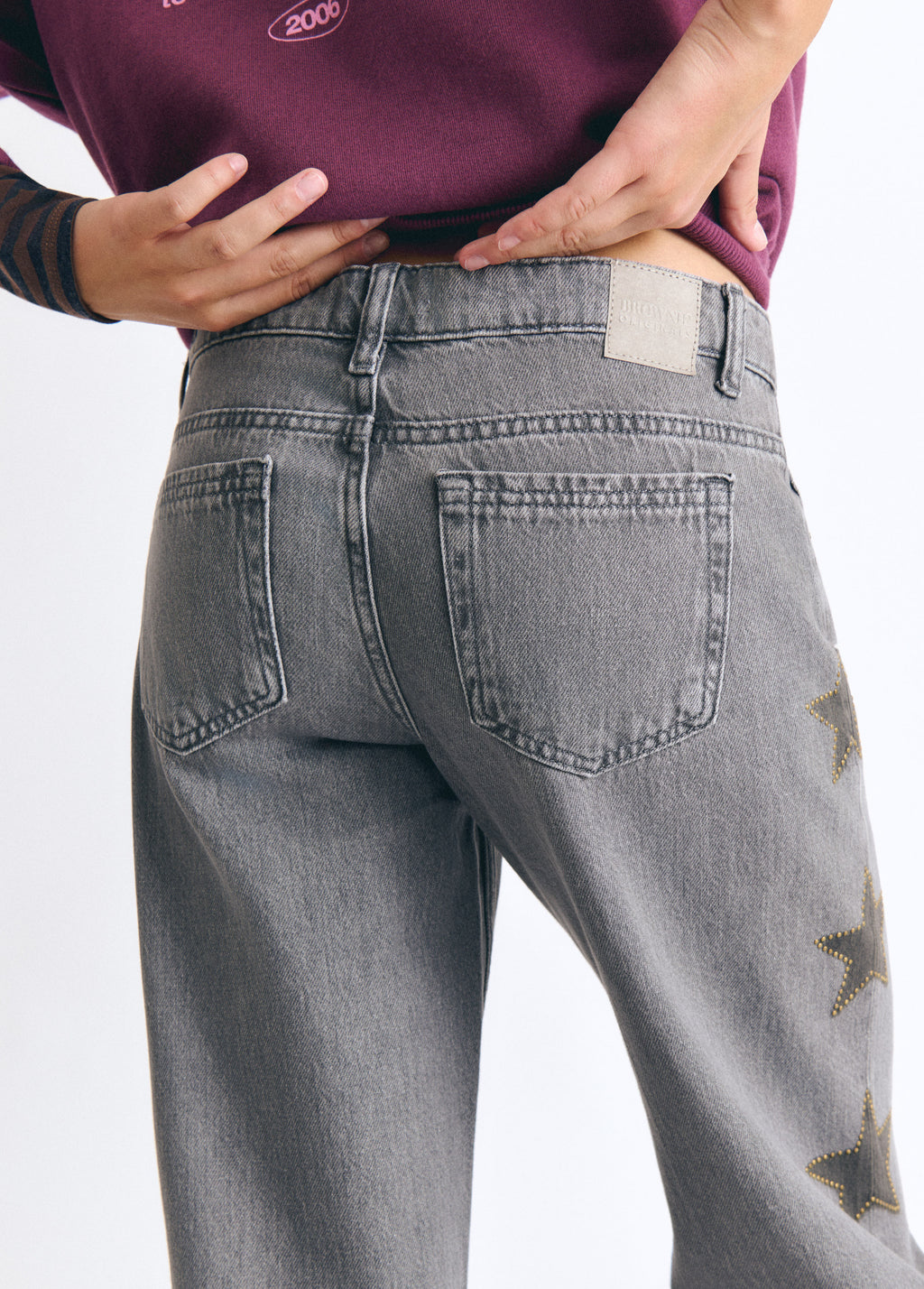 Jeans estrellas tachas lateral