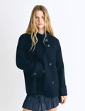 Coat with a high collar and wool content
