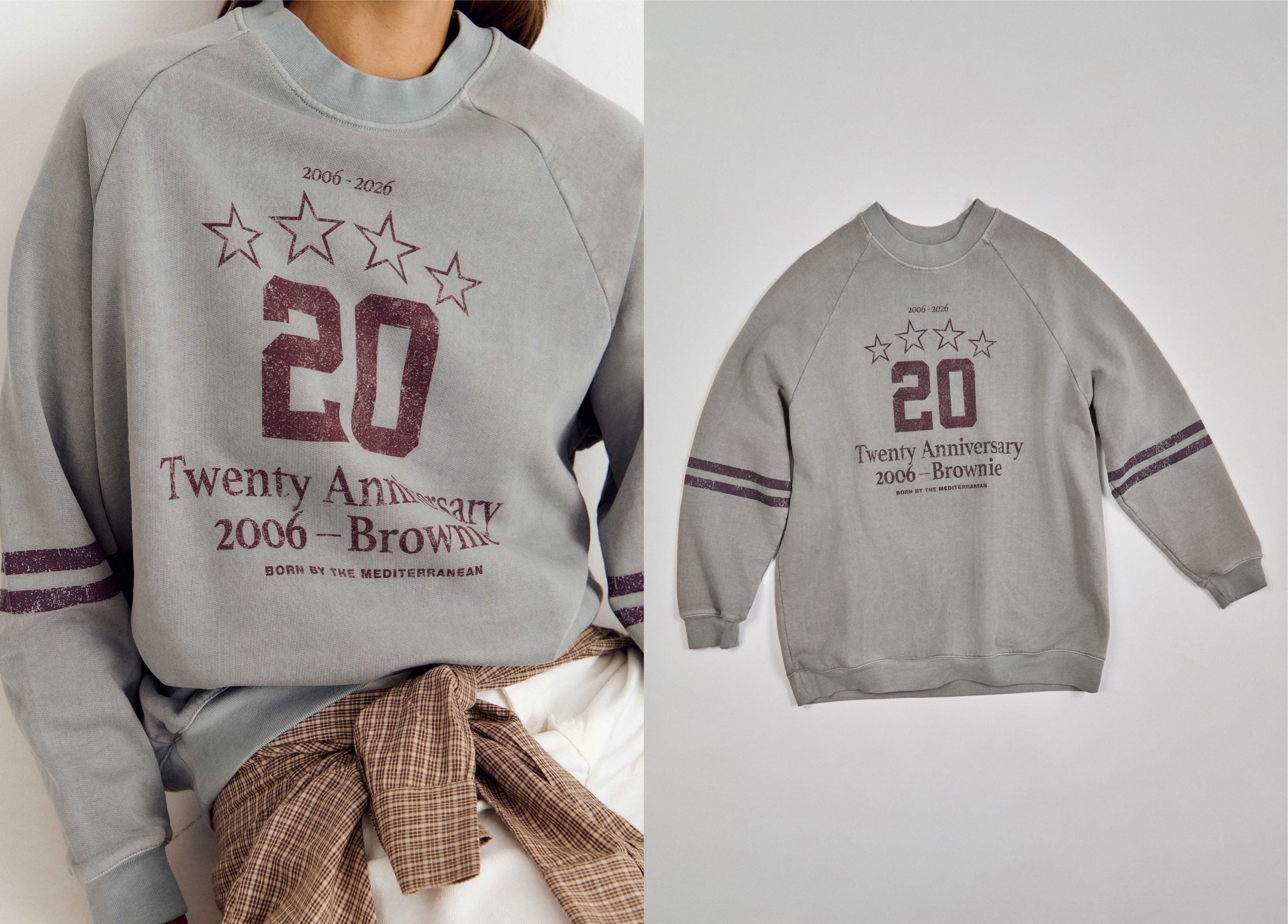Sudadera antracita con estampado de aniversario sobre modelo