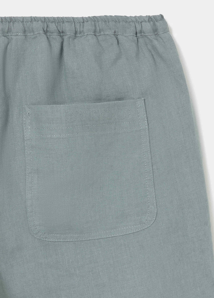 Pantalón fluido bolsillo parche