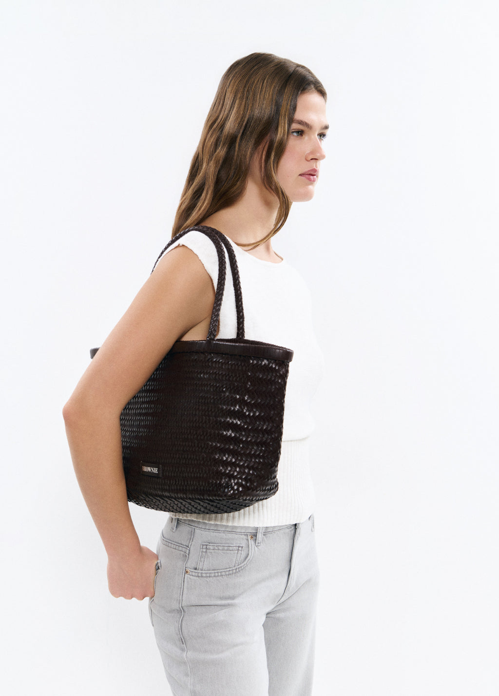 Mala shopper trançada em pele