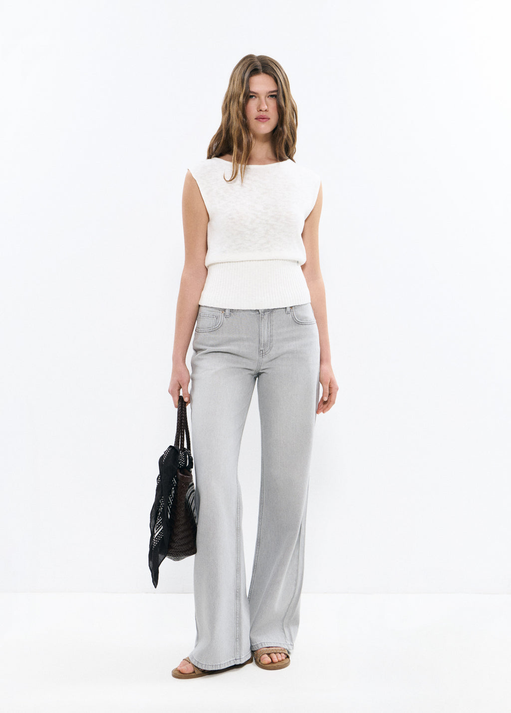 Mala shopper trançada em pele