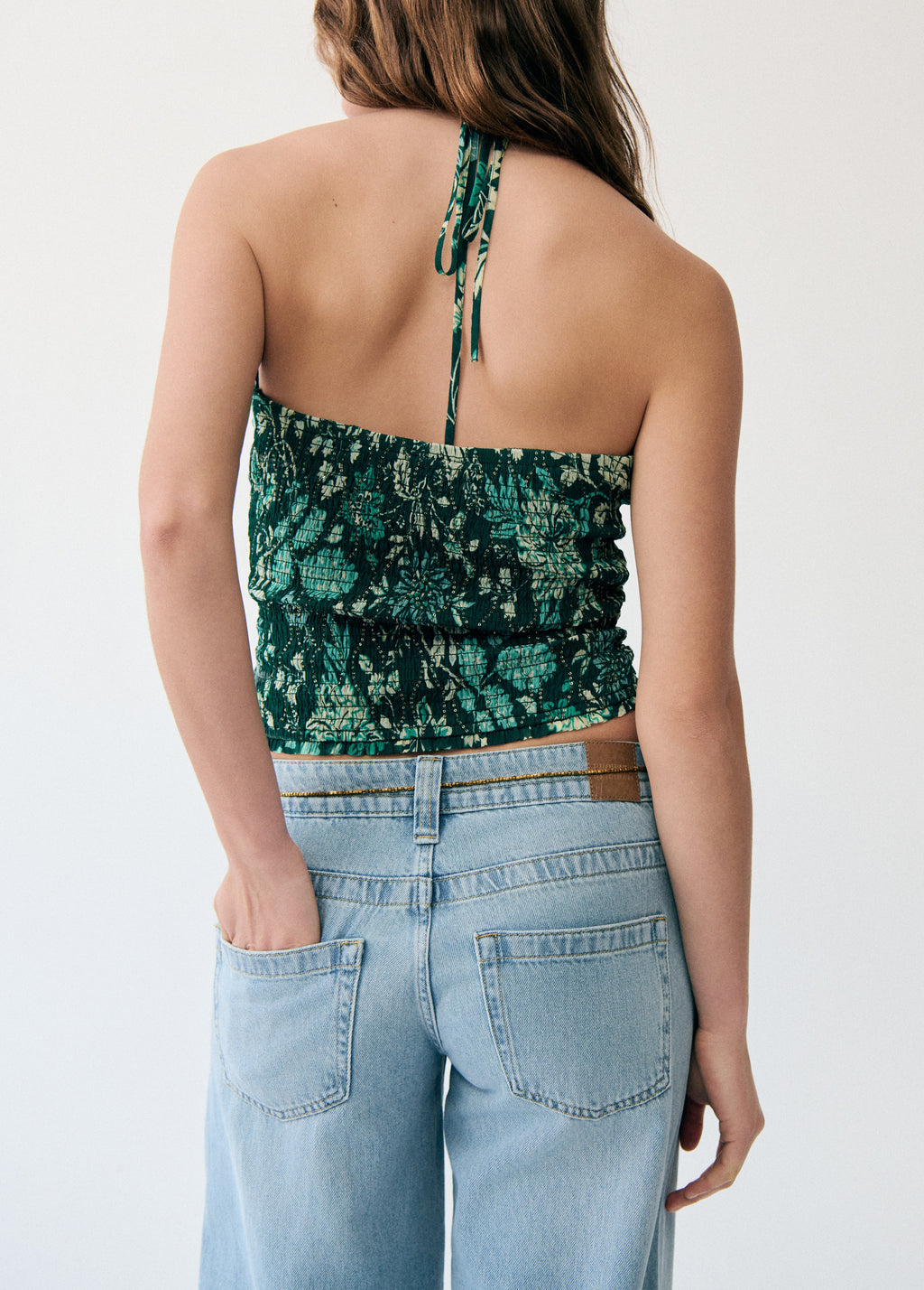 Top stampato con paillettes