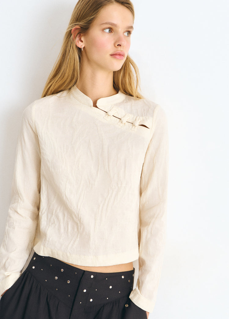 Jacquard blouse with button detail