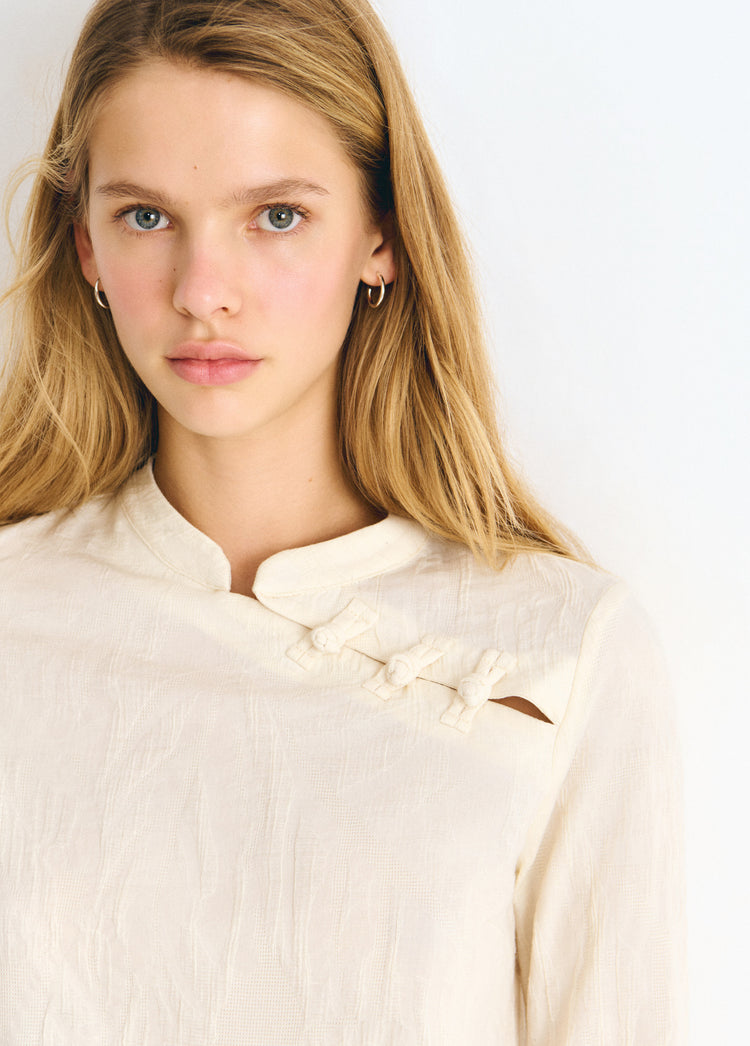 Jacquard blouse with button detail