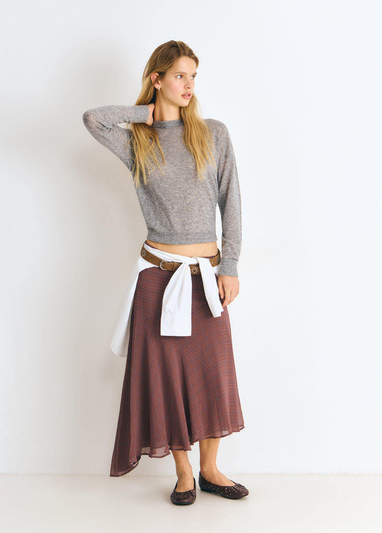 Lange geruite rok met asymmetrische zoom