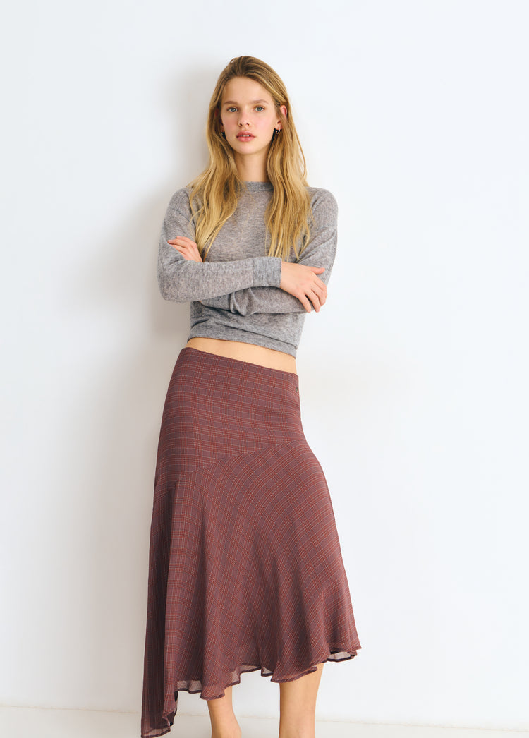 Lange geruite rok met asymmetrische zoom