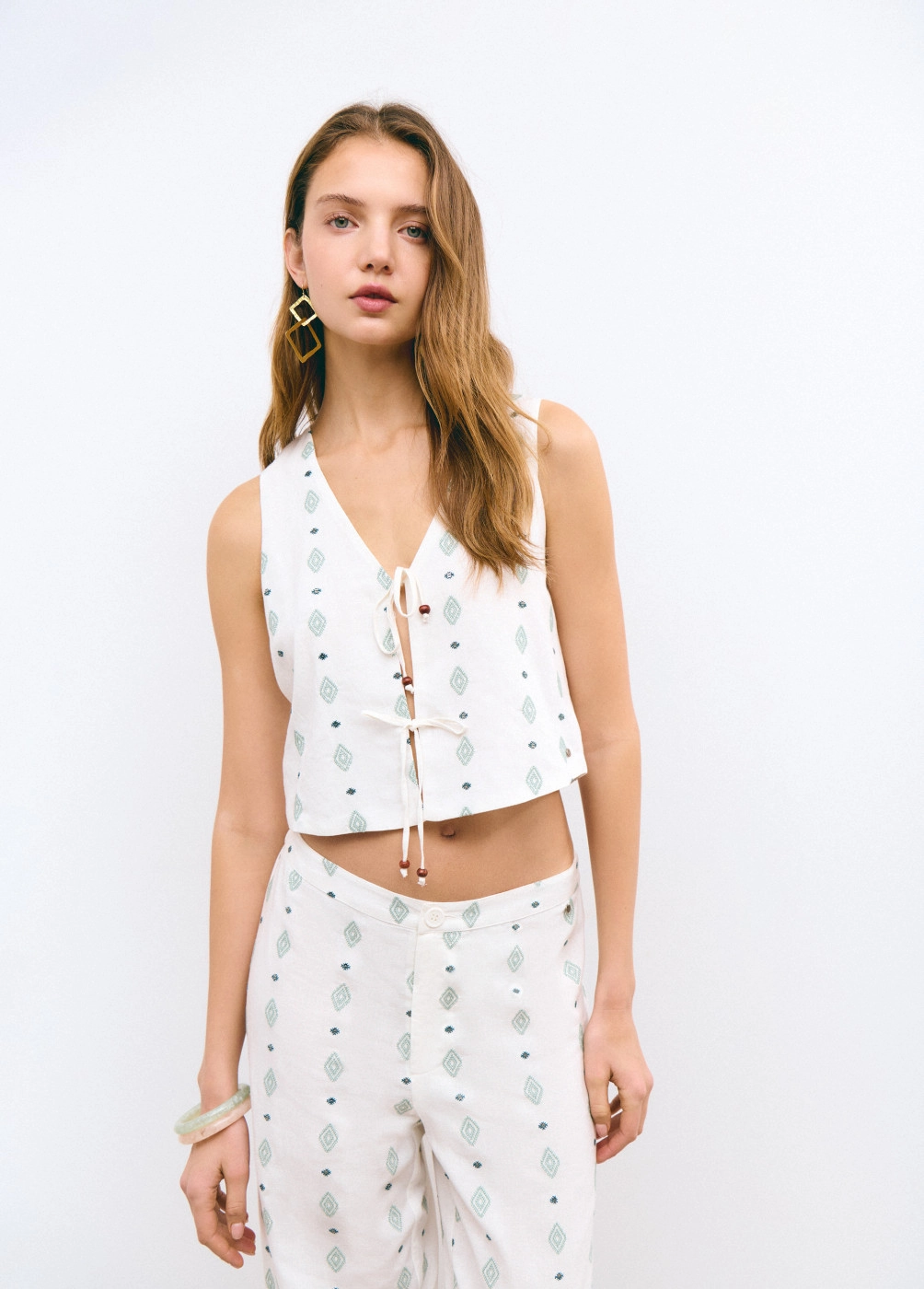 Gilet brodé liseré