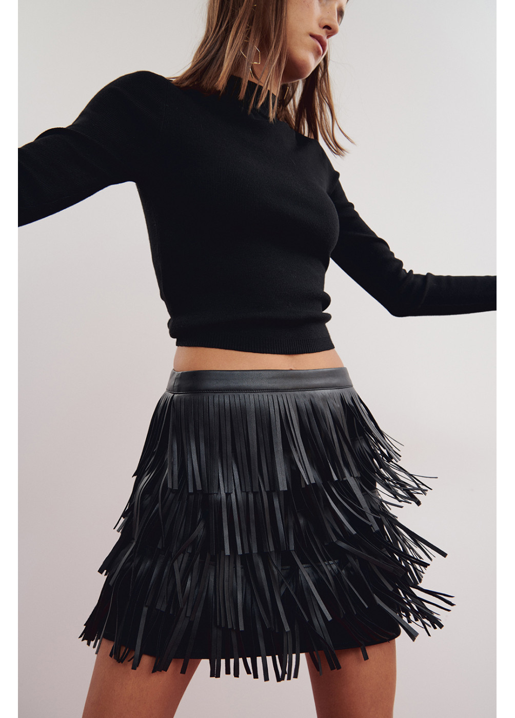LEATHER-EFFECT SKIRT WITH FRINGING