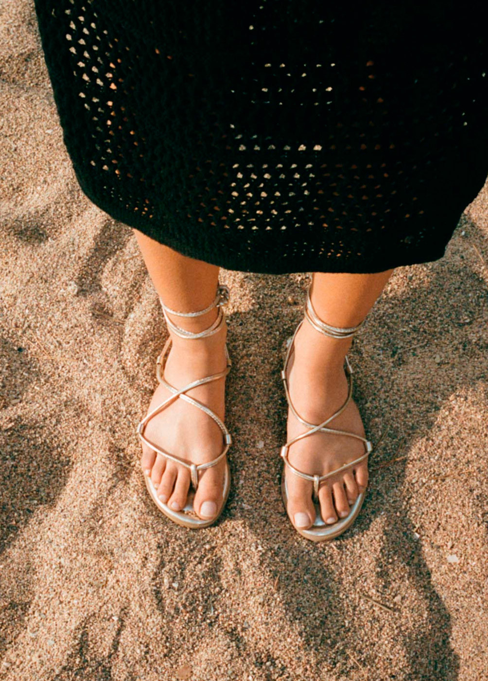 Flat sandals with cord ties