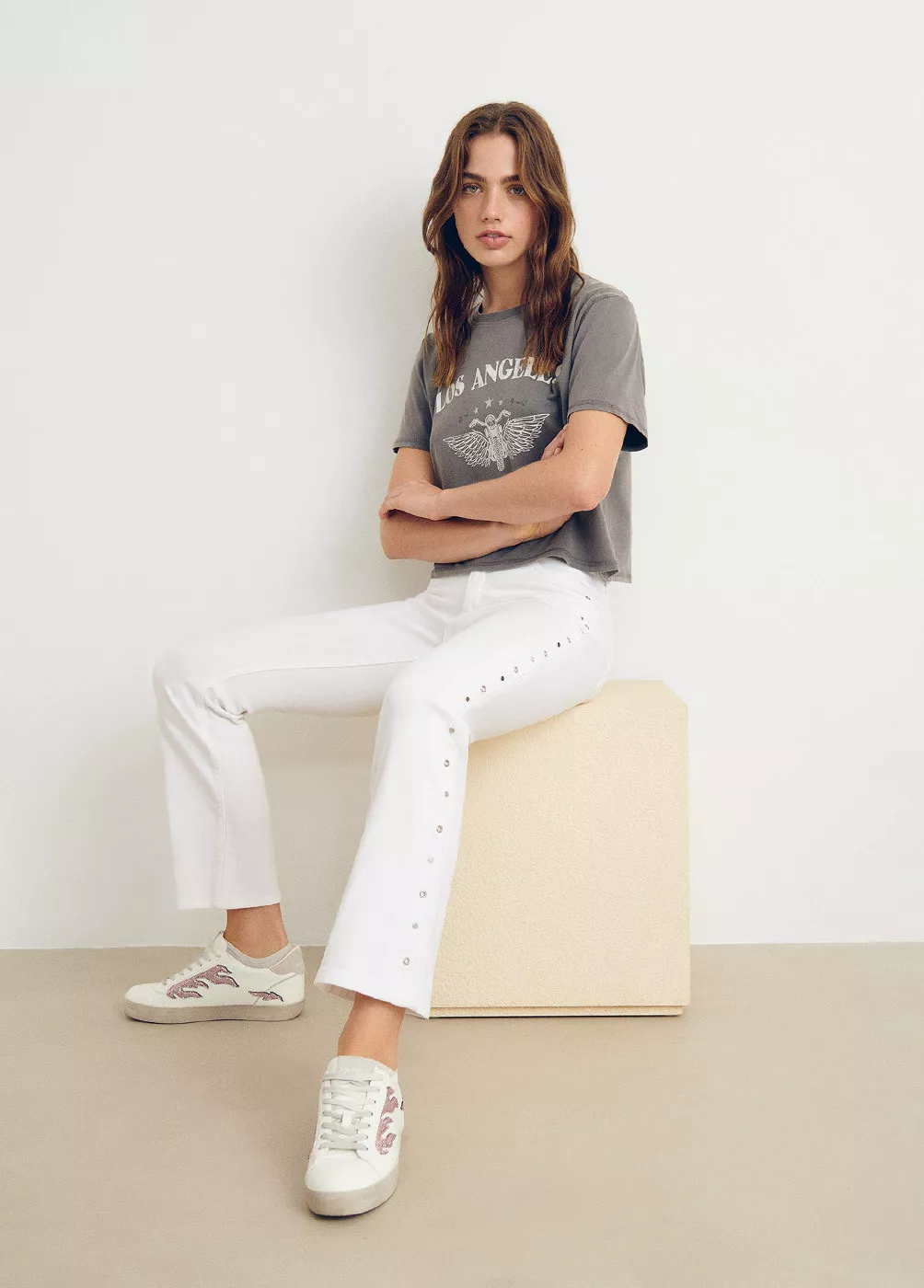 Cropped flare trousers with...